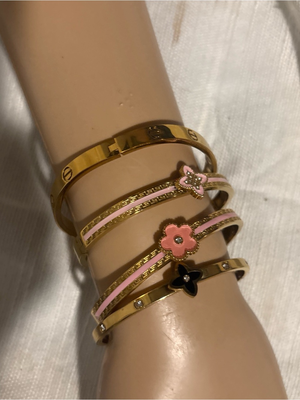 Designer inspired Gold Tone Bangle Stack with clover Flower pink & black Accents
